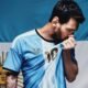 Lionel Messi besando el escudo de Argentina en la camiseta para su último partido. Foto Lionel Messi